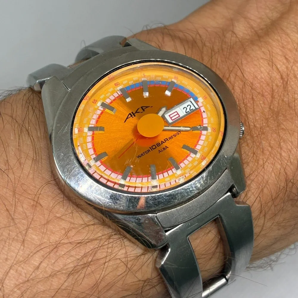 Vintage Seiko Alba AKA V743-5A10 Men's Quartz Watch Orange Dial 10BAR